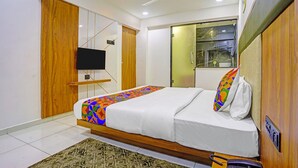 Egyptian cotton sheets, premium bedding, in-room safe, WiFi (free) - FabHotel Royal Manor - at Hospital Chowk (Rajkot)