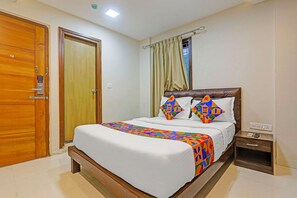 Deluxe Room | Egyptian cotton sheets, premium bedding, in-room safe, free WiFi - FabHotel Pooja - Near Bagalur Main Road (Bangalore)
