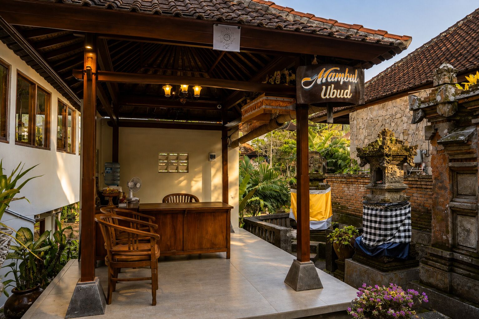 A traditional wooden structure with a sign reading 'Mambul Ubud.'