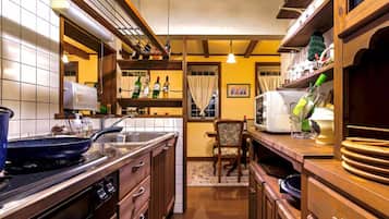 Fridge, microwave, stovetop, cookware/dishes/utensils