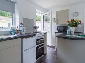 Fridge, microwave, oven, cookware/dishes/utensils