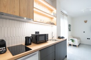 Fridge, microwave, coffee/tea maker, electric kettle