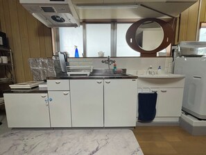 Fridge, microwave, cookware/dishes/utensils