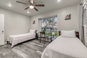4 bedrooms, desk, iron/ironing board, travel cot