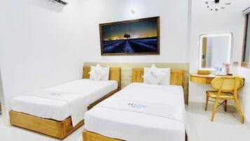 Camera Deluxe con 2 letti singoli | Una scrivania, insonorizzazione, Wi-Fi gratuito