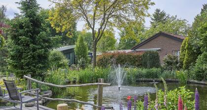 Cosy chalet in the middle of nature in a park