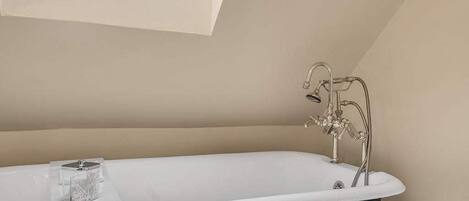 Shower, hair dryer, towels, shampoo