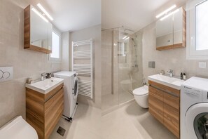 Shower, hair dryer, towels, soap