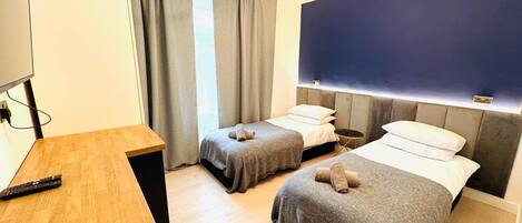 2 chambres, fer et planche à repasser, Wi-Fi, draps fournis