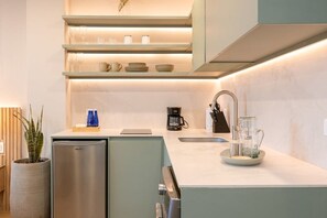 Microwave, coffee/tea maker, cookware/dishes/utensils