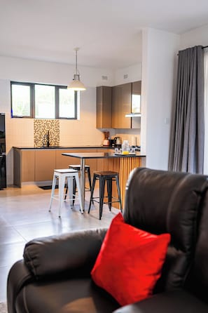 Apartment, Garden View | Living area - Sea Of Dreams (Victoria Falls)