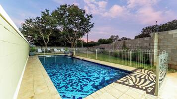 Outdoor pool, free pool cabanas, pool umbrellas