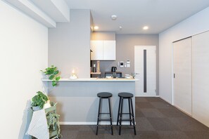 Family Suite, Non Smoking (901) | Living area | 50-inch flat-screen TV with cable channels - Living like Hotel hakataekiminami (Fukuoka)