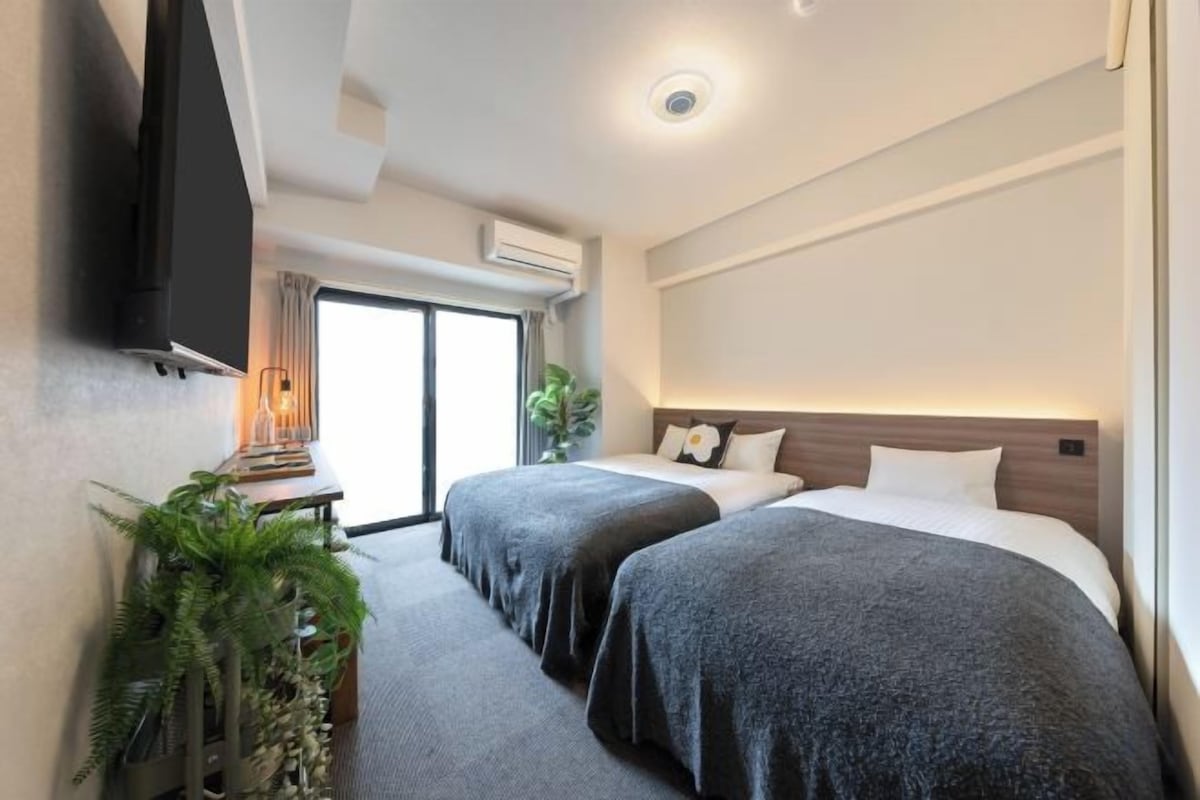 Blackout curtains, iron/ironing board, free WiFi, bed sheets