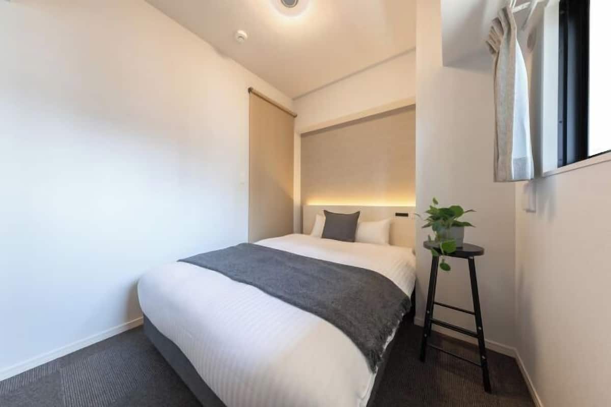 Blackout curtains, iron/ironing board, free WiFi, bed sheets