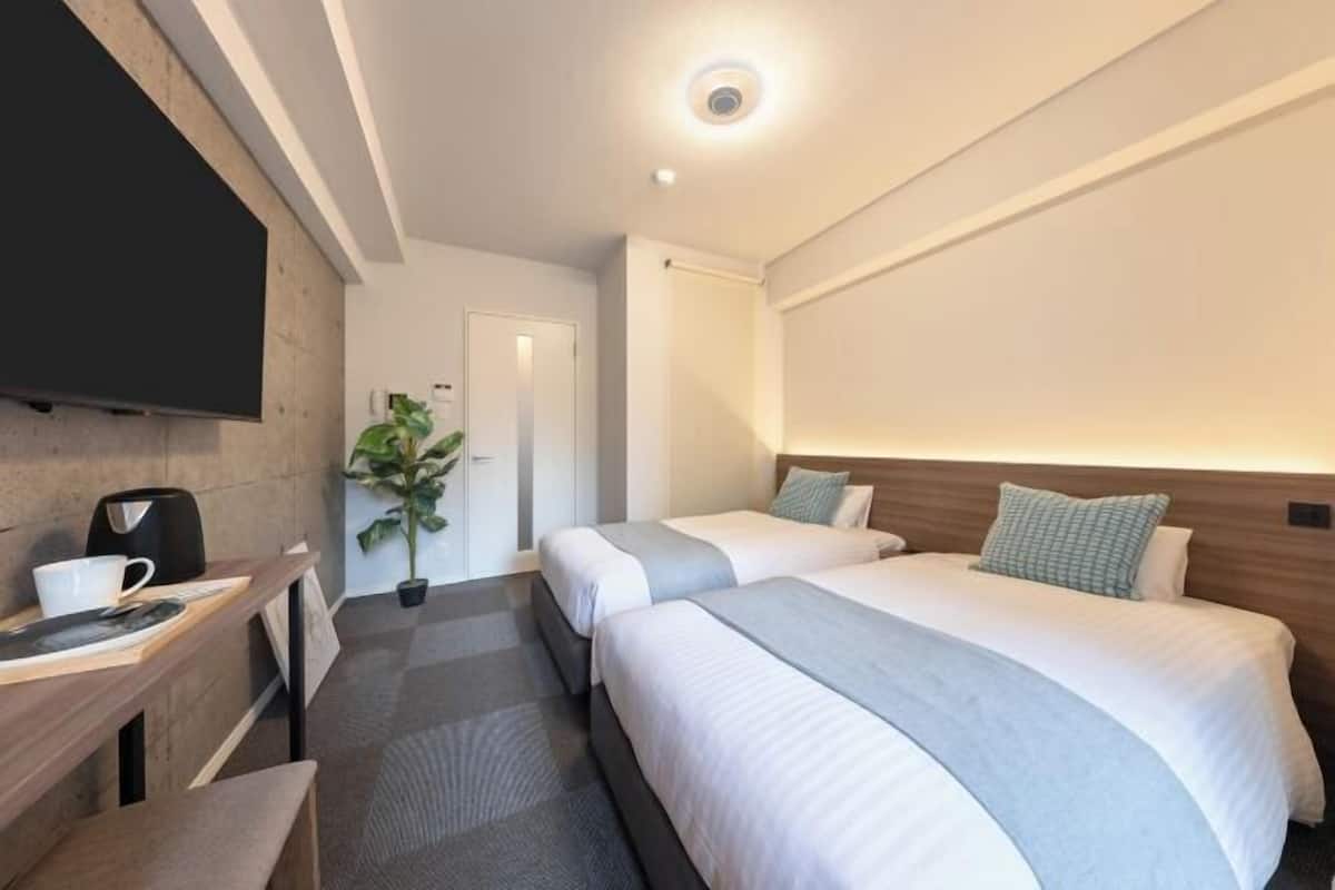 Blackout curtains, iron/ironing board, free WiFi, bed sheets