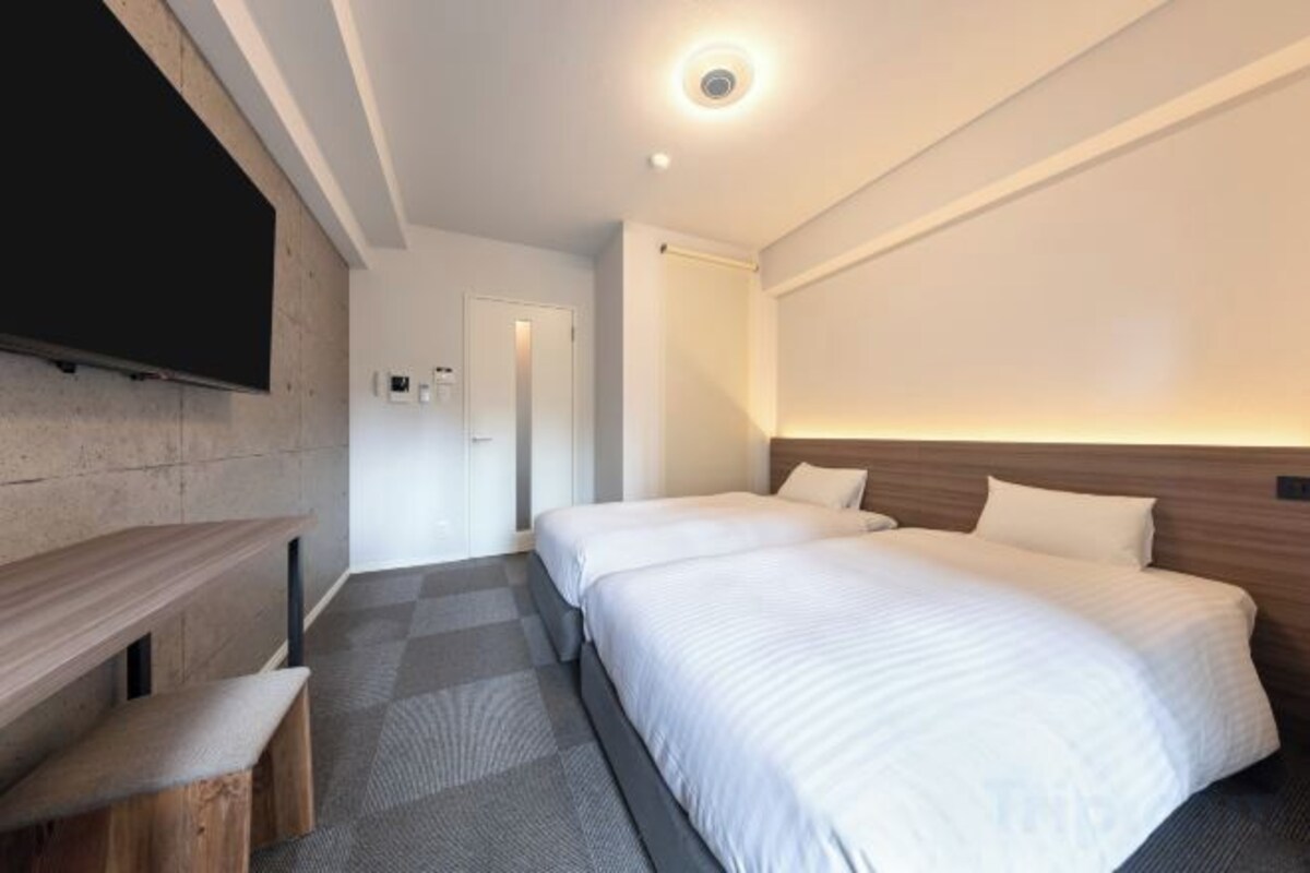 Blackout drapes, iron/ironing board, WiFi (free), bed sheets