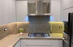 Fridge, microwave, oven, stovetop - Hotel Apartment in Sheikh Zayed – Zayed Suites A (First 6th of October)