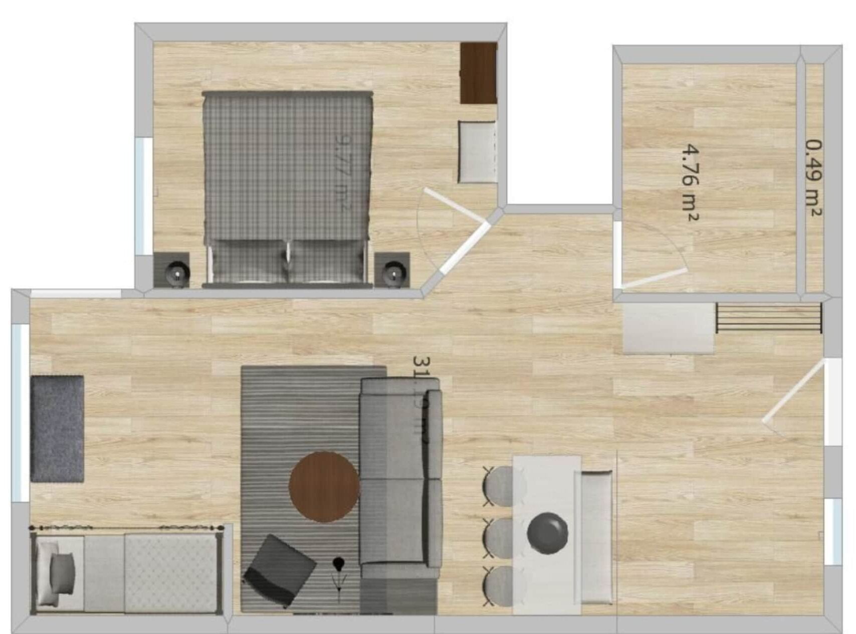 A floor plan of a hotel room with a bed, a seating area, a kitchenette, and a bathroom.
