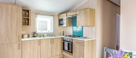 Refrigerador, horno, parrilla de estufa y tostadora