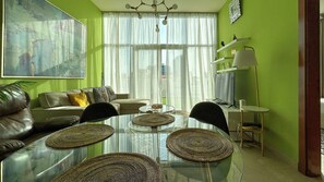 Deluxe Penthouse, 1 Bedroom, Balcony, Canal View | Living area | 55-inch Smart TV with cable channels - 1BR Penthouse in Millenium Binghatti (Dubai)