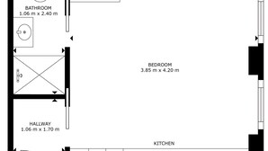 A floor plan with a bathroom (1.06 m x 2.40 m), a bedroom (3.85 m x 4.20 m), a hallway (1.06 m x 1.70 m), and a kitchen area. - The Philbeach Three (London)