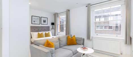 อพาร์ทเมนท์ (Stylish Studio Retreat in Trendy Mary) | ห้องนั่งเล่น