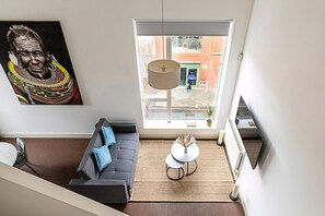 Apartment (Stylish Camden Flat Near Markets & Tu) | Living room | TV