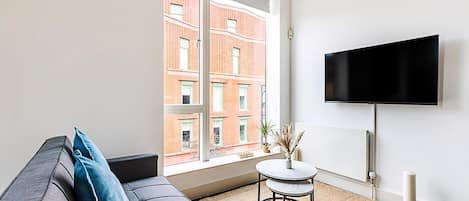 Apartment (Stylish Camden Flat Near Markets & Tu) | Living room | TV