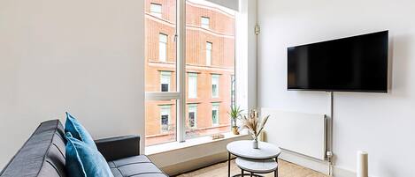 Apartment (Stylish Camden Flat Near Markets & Tu) | Living room | TV