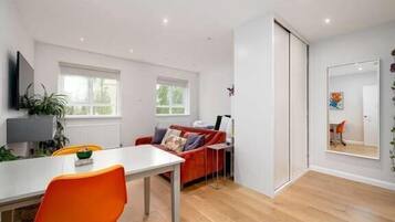 Apartment (Stylish Brixton Hill Studio with Mode) | Living room | TV