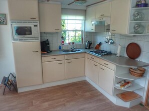 Coffee/tea maker, dining tables