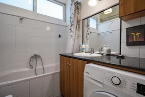 Hair dryer, towels, soap, toilet paper
