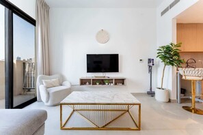 TV - Beachfront Apt with Private Beach & Pool Access (Sharjah)