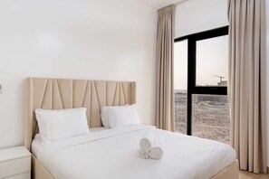 2 bedrooms, iron/ironing board, WiFi (free), bed sheets - Beachfront Apt with Private Beach & Pool Access (Sharjah)
