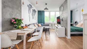Desk, laptop workspace, blackout curtains, iron/ironing board