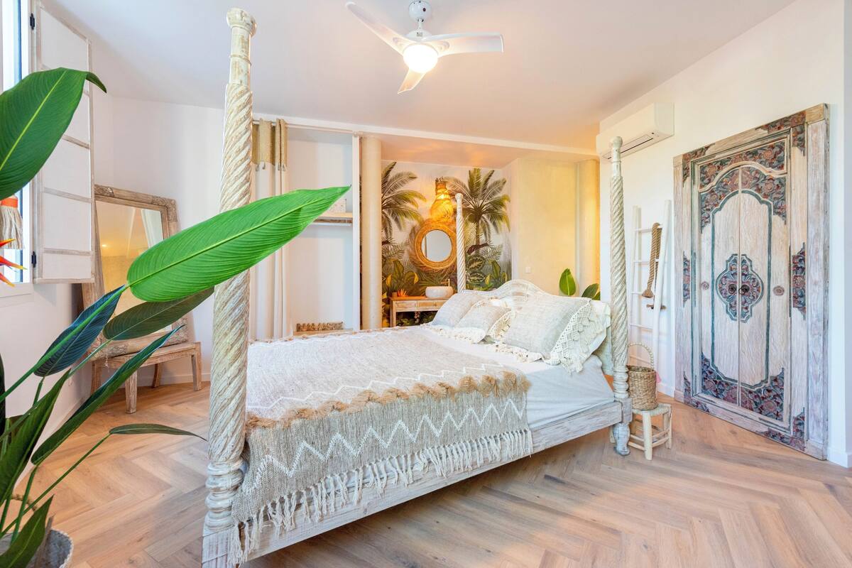 Deluxe Suite, Patio, Garden View | Blackout drapes, iron/ironing board, free WiFi