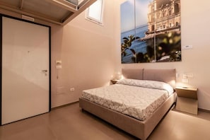 Apartamento luxo, vista para a cidade | Cofres nos quartos, cortinas blackout, ferros/tábuas de passar roupa