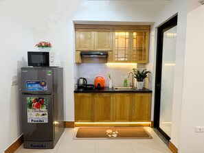 Deluxe Apartment, 1 Bedroom, Balcony | Private kitchen | Microwave, stovetop, cookware/dishes/utensils - The Bloom by Vega Hotel (Hanoi)