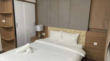 Deluxe Apartment, 1 Bedroom, Balcony | Iron/ironing board, free WiFi, bed sheets