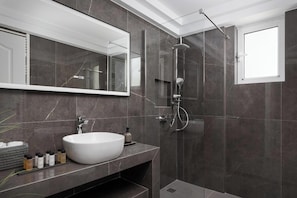 Deluxe Apartment, Balcony, Sea View | Bathroom | Shower, rainfall showerhead, eco-friendly toiletries, hair dryer