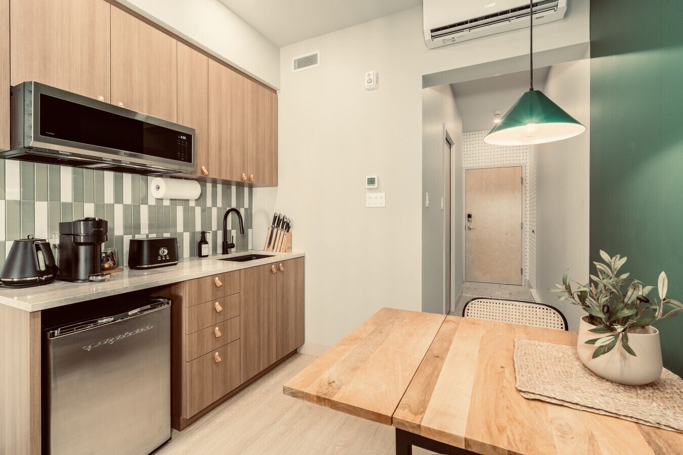 Fridge, microwave, stovetop, coffee/tea maker