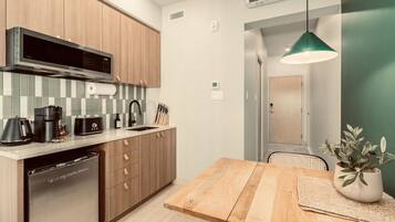Fridge, microwave, stovetop, coffee/tea maker