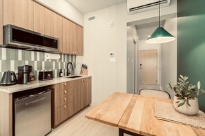 Fridge, microwave, stovetop, coffee/tea maker