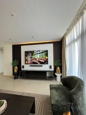 55-inch Smart TV with digital channels, Netflix, streaming services - 3 bedroom apartment (Dar es Salaam)