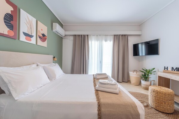 2 chambres, coffres-forts dans les chambres, fer et planche à repasser