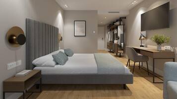 Een minibar, een kluis op de kamer, een bureau, een laptopwerkplek