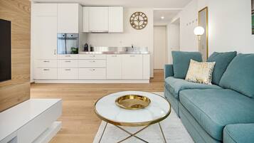 Design Apartment, 1 Bedroom, City View | Living area | TV