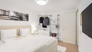 Design Apartment, 1 Bedroom, City View | Laptop workspace, blackout curtains, soundproofing, iron/ironing board