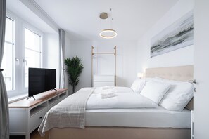 Design Apartment, 2 Bedrooms, City View | Laptop workspace, blackout drapes, soundproofing, iron/ironing board